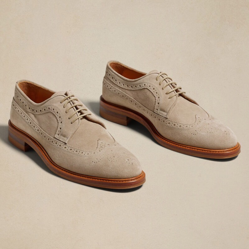 Three quarter view of Banana Republic's Vincent Suede Wingtip Oxford dress shoes.