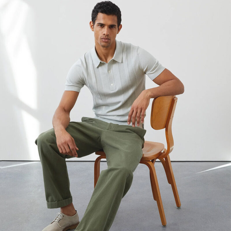 Male model wearing Todd Snyder Silk Cotton Polo in pale mint.