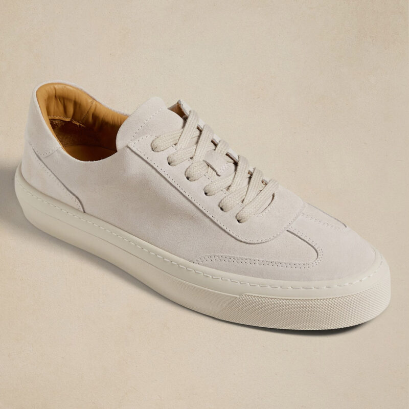Three-quarter view of Banana Republic's suede court sneaker.