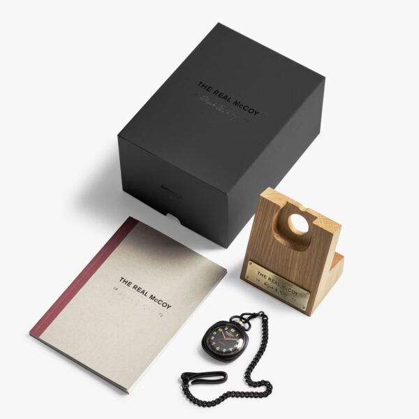 Full set of Shinola's Elijah McCoy Pocket Watch including box, stand, booklet, and watch